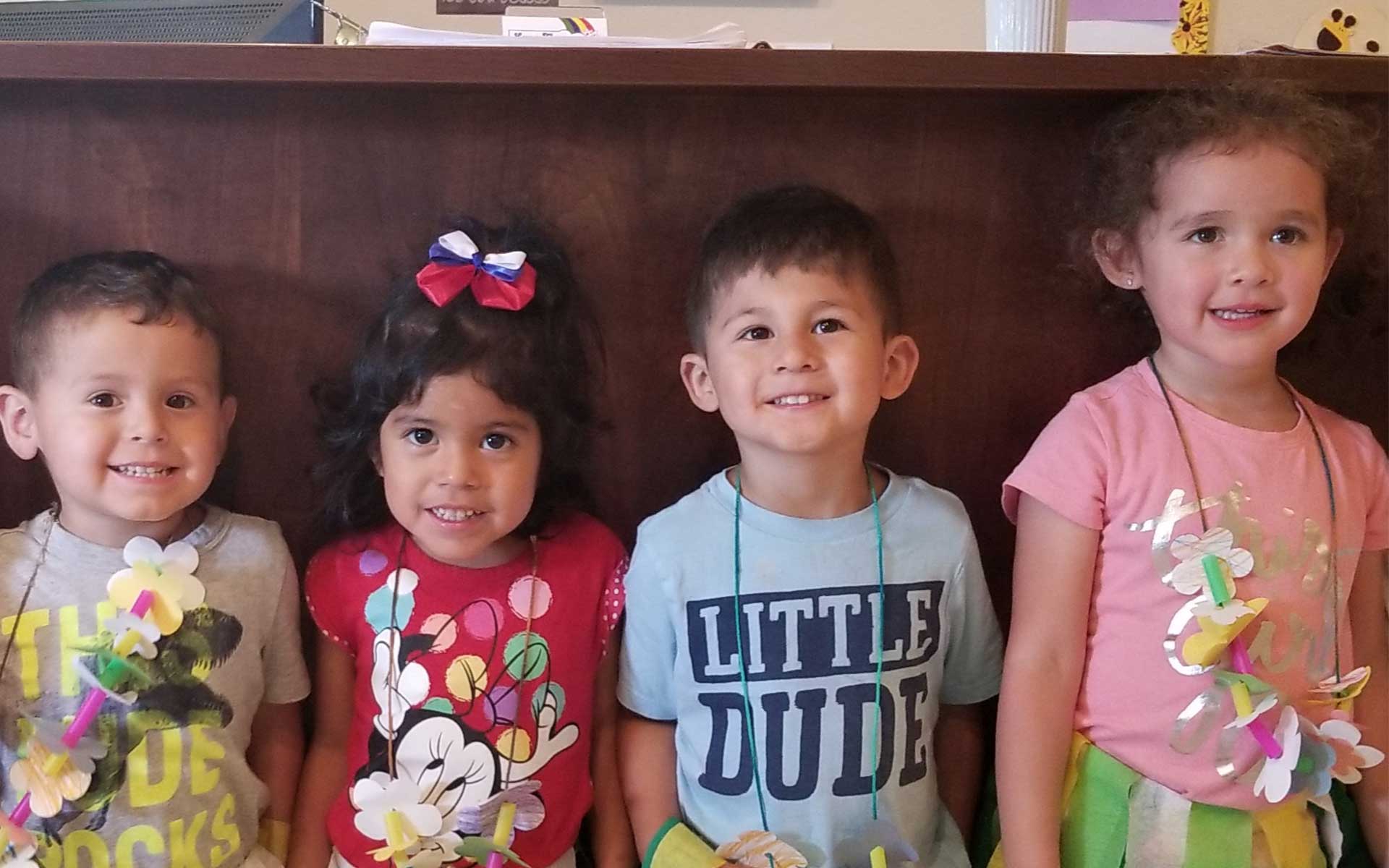 children in a line at luv n care daycare