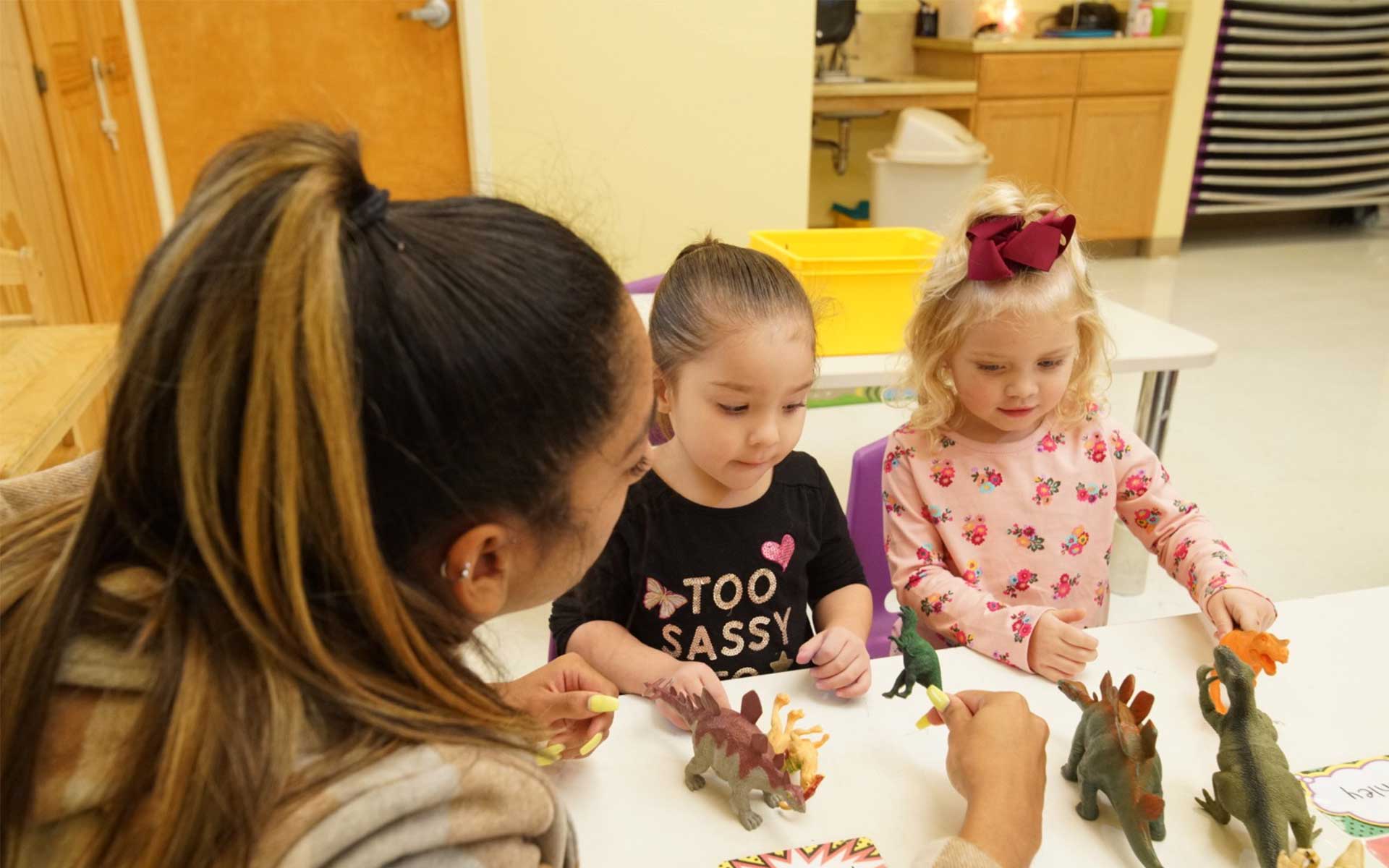 daycare children interacting with toys